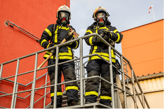 firemen in a building's stairs
